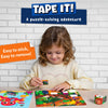 A young child is joyfully assembling the Skillmatics Tape It! puzzle game. She sits at a table placing a small animal sticker piece on a brightly illustrated forest puzzle board. A tape roll featuring cute animal images lies beside her. The background shows a white brick wall, with text reading “Easy to stick, easy to remove!” and “A puzzle-solving adventure.