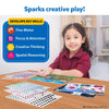 Young girl creating art with colorful Dot it! Peppa Pig sticker sheets and picture boards