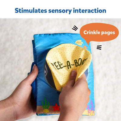 Child’s soft fabric book with crinkle pages and peek-a-boo flap from Under The Sea collection