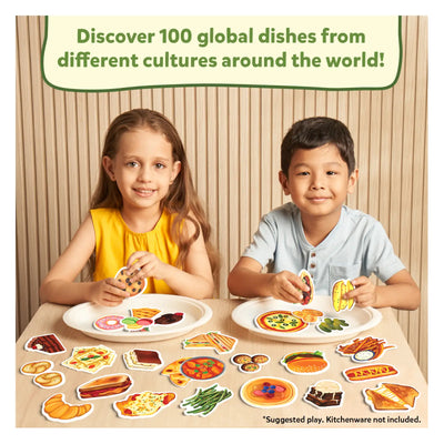 Two children playing with diverse realistic play food pieces for pretend cooking