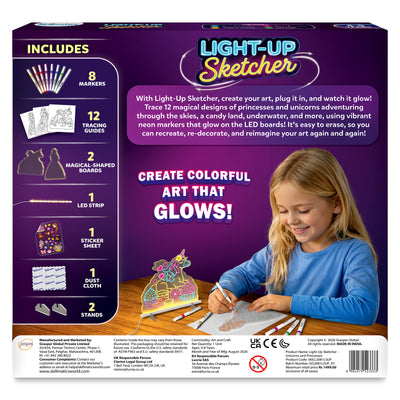 Skillmatics Light-Up Sketcher back packaging shown, featuring a child creating glowing art beside a unicorn light board. The box lists 8 markers, 12 tracing guides, 2 magical-shaped boards, 1 LED strip, 1 sticker sheet, 1 dust cloth, and 2 stands, with product and safety details below.