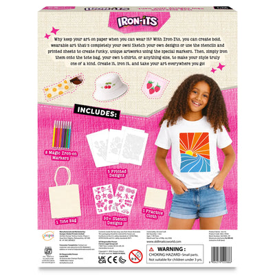 Skillmatics Iron-Its box back panel. Smiling girl wears white tee with colorful sunset iron-on print. Kit includes 8 iron-on markers, 5 printed designs, canvas tote bag, 30-plus stencil designs, and practice cloth. Inset images show orange-print pouch, cherry bucket hat, and strawberry fabric patch.