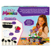 Back of the Foil Fun Mosaics craft kit box showing the included flower pot, lid, foil sheets, foam stickers, flower pieces, stems, and mosaic decorations. A child assembles colorful glitter flowers into the pot while the layout highlights the kit contents and finished display project.