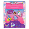 Back view of the Shake-its Unicorns & Princesses packaging showing hanging finished shake-it keychains, including a princess, unicorn, and castle, each filled with confetti and shown mid-swirl. A pink text panel explains the activity steps, while a purple section at the bottom displays icons and labels for contents: six confetti packs, six foam shake-its, six transparent sheets, and six keychains, set against a rainbow and cloud background.