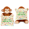 A brown plush monkey sits upright holding a soft cream-colored cloth with multicolored dots. The cloth covers its face in one version and is held below its eyes in another. The text “Peek-a-boo, where are you?” and a small blue Skillmatics logo appear on the cloth. The monkey has stitched facial features, light beige inner ears, and soft limbs positioned outward.