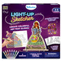 Skillmatics Light-Up Sketcher box for ages 4–8, with glowing princess, unicorn and rainbow artwork, reusable stickers, 12 tracing guides, 8 markers, two magical-shaped boards, LED strip and stands. Purple packaging highlights mess-free play and includes a small-parts warning.