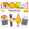 Skillmatics Wriggle & Wonder High-Contrast Rattle Socks & Wristbands for babies 0–12 months, shown with rainbow and cloud socks plus sun and star wristbands. Packaging highlights visual stimulation, sensory-rich play, early motor skills, 2 socks and 2 wristbands.