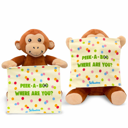 A brown plush monkey sits upright holding a soft cream-colored cloth with multicolored dots. The cloth covers its face in one version and is held below its eyes in another. The text “Peek-a-boo, where are you?” and a small blue Skillmatics logo appear on the cloth. The monkey has stitched facial features, light beige inner ears, and soft limbs positioned outward.