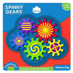 Skillmatics Spinny Gears Pattern Pop toy packaging for ages 6–36 months. Includes five colourful interlocking gears with bold swirl, stripe, and spiral patterns in red, yellow, green, purple, and blue. The packaging highlights “Encourages early STEM skills through play!” and “Interlocking Gears.” A vibrant sensory toy for toddlers that builds fine motor skills and cause-and-effect learning.