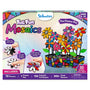 Skillmatics Foil Fun Mosaics craft kit packaging for ages 8–99 featuring a colourful 3D foil flower pot project. Shows glittery mosaic flowers, stems, leaves, and decorated pot. Includes step visuals for sticking foam pieces, peeling stickers, pressing foil sheets, and contents including 150 foil sheets.