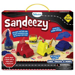 The Sandeezy skill-building kit box shows a red background with the Skillmatics logo, “Sandeezy” in bold letters, and a “3–7 years” badge. The display features kinetic sand in red, yellow, and blue jars, three moulded vehicle shapes, and sample creations including a fire engine, crane, and car with wheels. Callouts highlight “Create 10+ unique vehicles,” “Super sand that sticks,” and “Squish, shape, and mould without drying out.”
