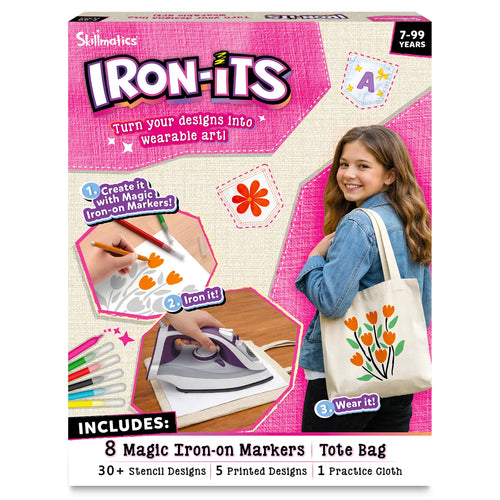 Skillmatics Iron-Its craft kit in pink box. Smiling teen girl holds canvas tote bag with orange tulip art. Three steps shown: create with magic iron-on markers, iron design onto fabric, then wear it. Includes 8 markers, tote bag, 30+ stencils, 5 printed designs, practice cloth. Ages 7–99.