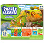 Skillmatics Puzzle & Learn: All About Wild Animals box showing a 25-piece puzzle for ages 3–7. The cover features illustrated wild animals including lions, elephants, giraffes, zebras, rhinos, deer, cheetah, bison, ostrich and more, plus six educational learning boards and a safety warning.