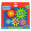 Skillmatics Spinny Gears Pattern Pop toy box on a red background for ages 6–36 months. Five interlocking plastic gears shown: red sunburst, green blue-yellow spiral, blue concentric circles, yellow with purple cross, and purple with yellow stripes. Labels read 
