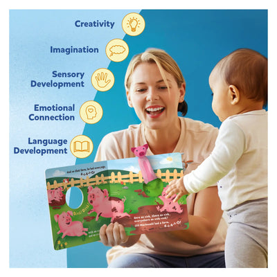 Interactive children’s book with pigs held by adult and observed by baby in Sensory Giggles Bundle