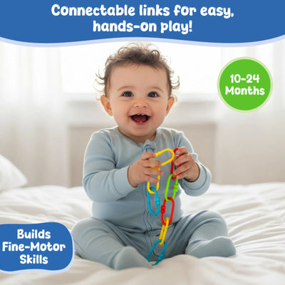 A smiling baby seated on a soft bed holds and explores a colorful chain of plastic links using both hands. The links appear in bright yellow, red, green, and blue. Text above reads “Perfectly sized for tiny fingers,” and a badge indicates suitability for ages 10–24 months. A callout highlights that the toy helps build fine motor skills through hands-on play.