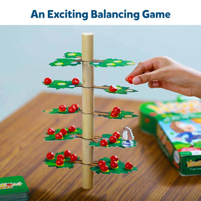 Multi-tiered wooden balancing game with red fruit-shaped pieces from Newtons Tree STEM toy
