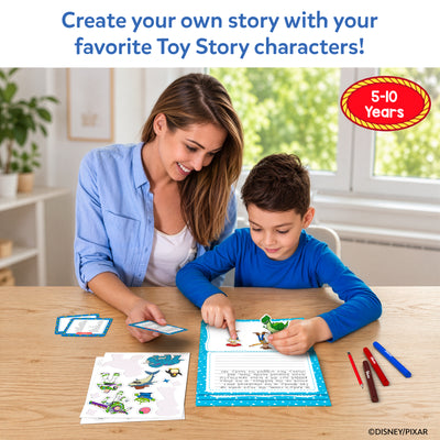 A smiling woman in a blue shirt and a boy in a blue top sit at a wooden table using the Skillmatics Toy Story My Story Art Kit. The boy places character stickers onto a blue story pad while the woman holds a vocabulary card. Markers, sticker sheets, and written story pages are spread on the table. Age label reads "5–10 Years."