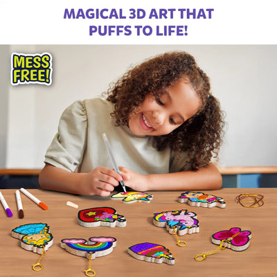 Child decorating charm shapes with Aqua Puffs Princesses & Unicorns 3D Art Kit