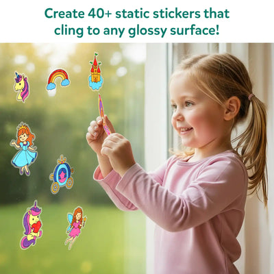 A young child stands beside a large window, smiling while holding a transparent princess-themed static sticker. Colorful unicorns, fairies, castles, rainbows, and carriages cling to the glass around her. A headline reads “Create 40+ static stickers that cling to any glossy surface,” showing how finished stickers adhere cleanly to windows without glue or residue.