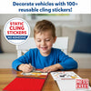Smiling young boy using Peelies Cars Trucks & More reusable sticker activity book