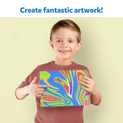Smiling young boy holding vibrant abstract artwork from Marbling Magic Paint Kit