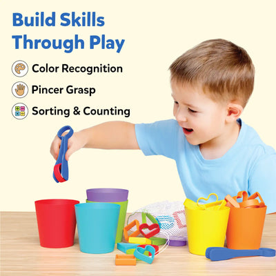 Young child playing with colorful Silicone Rainbow Sorting toy for learning and development