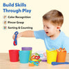Young child playing with colorful Silicone Rainbow Sorting toy for learning and development