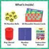 Illustrated layout titled “What’s Inside!” showing the Pop-Reveal Housie components. Items include 90 numbered yellow balls displayed in rows, 40 reusable housie cards in multiple colors, a blue number tray with numbered slots, a red pop-reveal can, and an instruction manual, all clearly labeled against a green patterned background.