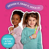 Two smiling young girls holding colorful customizable Snap Bandz slap bracelets for kids