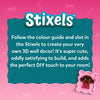 Branding panel for Skillmatics Stixels featuring a bold ‘Stixels’ logo on a pink background with a teal text box explaining: follow the color guide, slot Stixels to create a 3D wall décor that is cute and satisfying, with a small finished puppy example shown at bottom right.