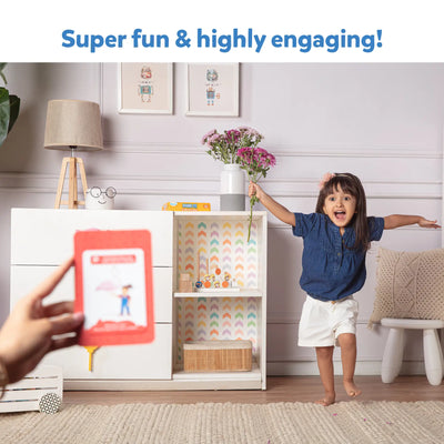 Young child using an interactive learning flashcard from Found It! Home Edition Smart scavenger hunt