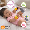 Smiling baby wearing Skillmatics Wriggle & Wonder socks and wristbands on hands and feet, with callouts for adjustable fit, baby safe and ultra soft. A hand-wash icon appears below, highlighting the product’s soft, wearable design for infant sensory play.