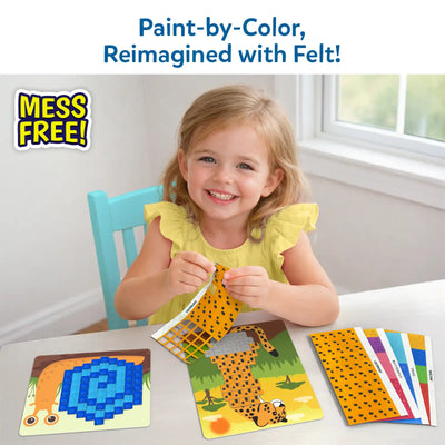 Smiling young girl seated at a table placing colorful felt squares onto an animal picture board. She holds a spotted felt piece while assembling a leopard design. Nearby are additional felt sheets and a snail picture board. Text reads “Paint-by-Color, Reimagined with Felt!” with a “Mess Free!” badge emphasizing clean, reusable craft play.