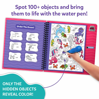 An open Skillmatics Water Spotter activity book displaying an underwater unicorn and princess scene, with a child’s hand using a blue water pen to reveal colorful hidden objects. The left page lists objects to find, while the right page shows detailed illustrations. Text emphasizes spotting 100+ objects and that only hidden elements reveal color with water.
