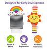 Skillmatics Wriggle & Wonder high-contrast socks and wristbands shown with early-development benefits: cause and effect, auditory awareness and tactile exploration. A rainbow sock and sun wristband are centered within a dotted circle with supporting icons.