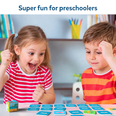 Two young children playing Memory Match game with colorful cards for ages 3 to 7
