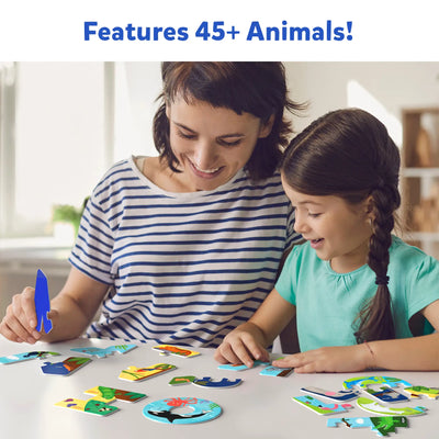 Mother and daughter playing with colorful animal-themed jigsaw puzzle from The Animal Alphabet set