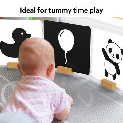 Baby playing on a mat with high-contrast flashcards from High Contrast Flash Cards for Infants