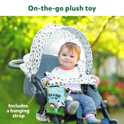 Baby in stroller with hanging Peek-A-Boo Jungle Theme soft book for ages 6 months+