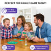 A family of four is enjoying Who Saw What during family game night. Two adults and two children sit around a wooden table, smiling and cheering. One child raises both hands in excitement while others hold green letter cards and a picture card. An hourglass timer sits at the center of the table. A banner at the top reads “Perfect for Family Game Night!” indicating fun, interactive play.