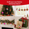 Skillmatics Aqua Puffs Christmas Ornaments display showing festive 3D art decorations used for Christmas decor. Four scenes feature colourful ornaments hanging on a Christmas tree, window garland, fireplace garland, and gift boxes. Designs include Santa, gingerbread figure, candy cane, baubles, and teddy bear.