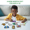 Young boy happily coloring animal and object shapes with Aqua Puffs Animal Friends 3D Art Kit