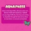 Instruction graphic with Aqua Puffs logo on pink background explaining process: color the Aqua Puffs, add water to watch art grow, let dry, then attach string or keychain to use as room decor or accessories. Includes bold headline and butterfly design example in bottom corner.