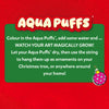 Skillmatics Aqua Puffs instruction graphic showing the creative process. The image features the Aqua Puffs logo and explains colouring the designs, adding water, watching the art grow, drying the pieces, and using string to hang them as Christmas tree ornaments. A pink star-pattern bauble is shown as an example.