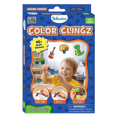 Front view of the Skillmatics Color Clingz box featuring a blue background with orange accents. Text highlights “40+ Static Stickers,” “Mess Free,” and “3–7 Years.” A child is shown holding a colored airplane cling. Circular visuals at the bottom show the steps “Color, Peel, Cling!” along with themed icons like vehicles, sports, and dinosaurs, plus a safety warning.