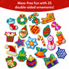 Skillmatics Foil Fun Christmas activity showing 25 double-sided glitter ornaments arranged on a white background. The colourful foil designs include stockings, bows, stars, snowflakes, trees, bells, gifts, candy canes and baubles in festive red, green, gold, blue and silver shades.