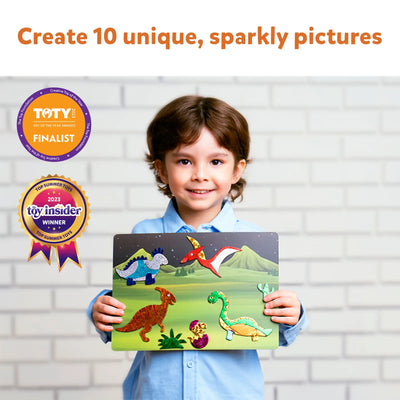 Young boy holding Dinosaur-Themed Craft Kit with Sparkly Designs from Artsy Animal Pack