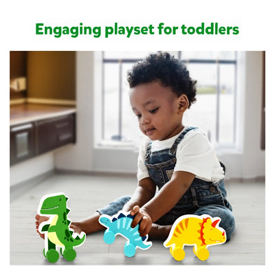 Toddler playing with Wooden Dinosaur Toys on Wheels from Dinosaurs on Wheels collection