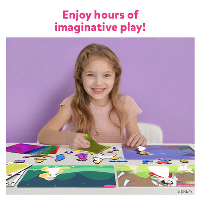 Smiling young girl playing with Disney Princess magnetic dress-up set from Foil Magic Wonderland
